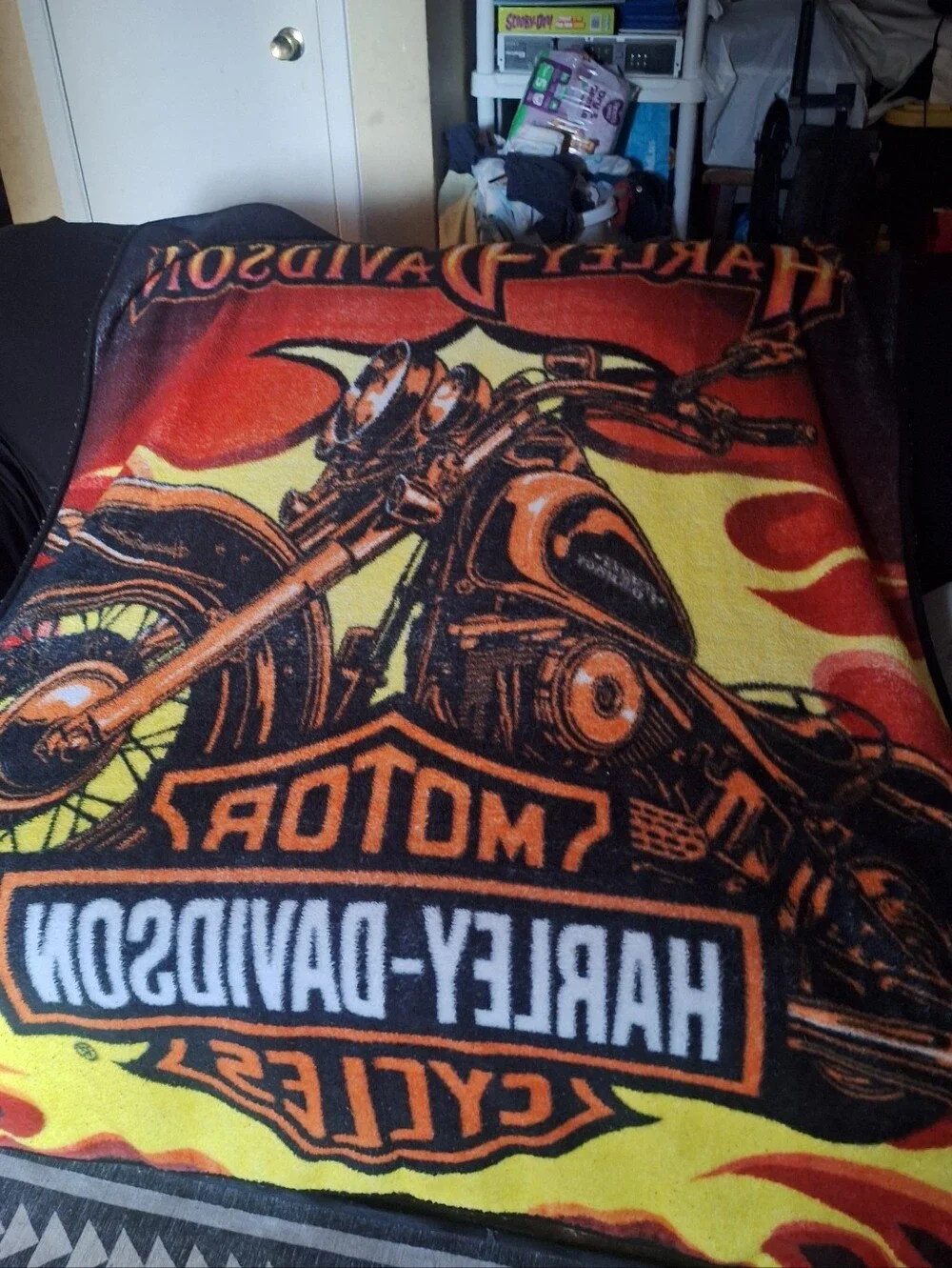 Harley Davidson Blanket in black and orange is a cozy and stylish addition.
